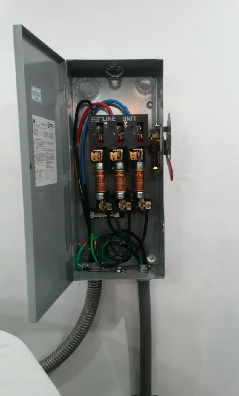 Three-phase disconnect switch installed for Smoke Detector Installation in Ayer