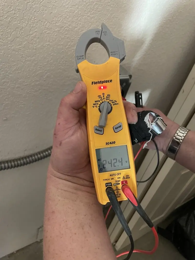 Voltage testing with clamp meter during Generator Installation in Ayer